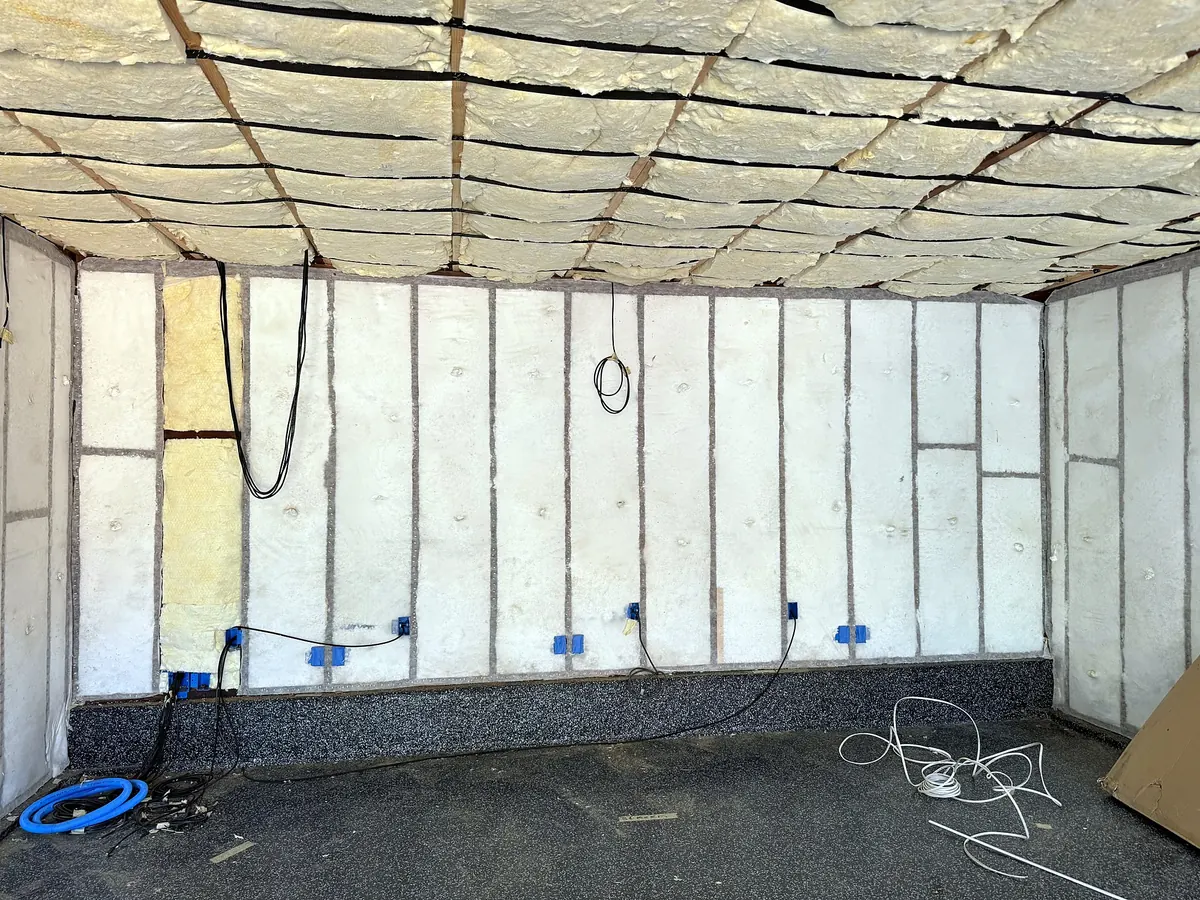 Garage walls insulated before drywall